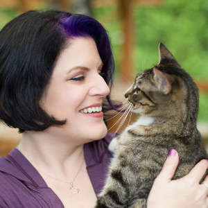 Feline Behaviorist Marci Koski holding a cat
